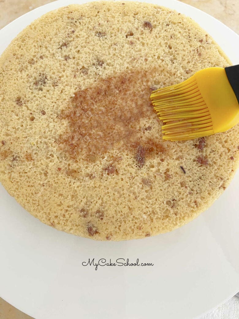 Maple Pecan Cake Mix Recipe- Brushing Cake Layers with Maple Syrup