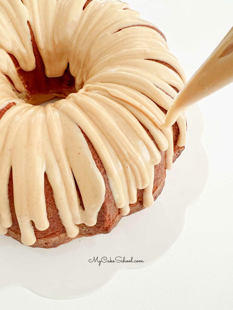 Adding the Peanut Butter Glaze to the Pound Cake