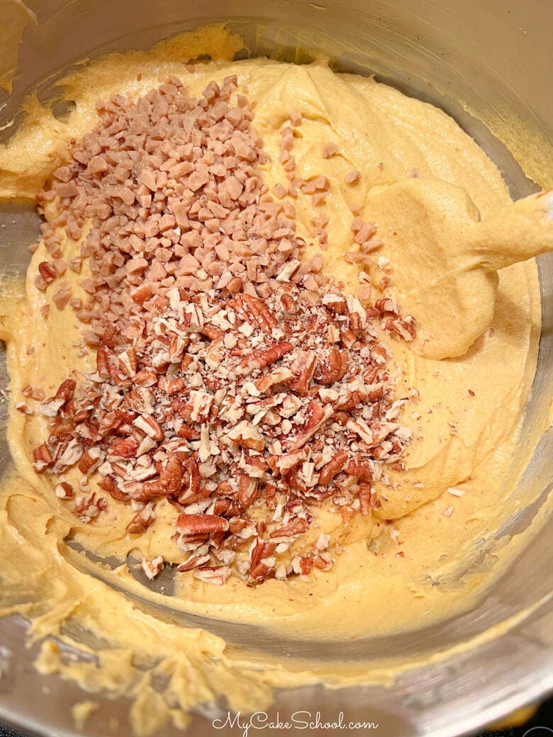 Folding Toffee Bits and Pecans into Cake Batter