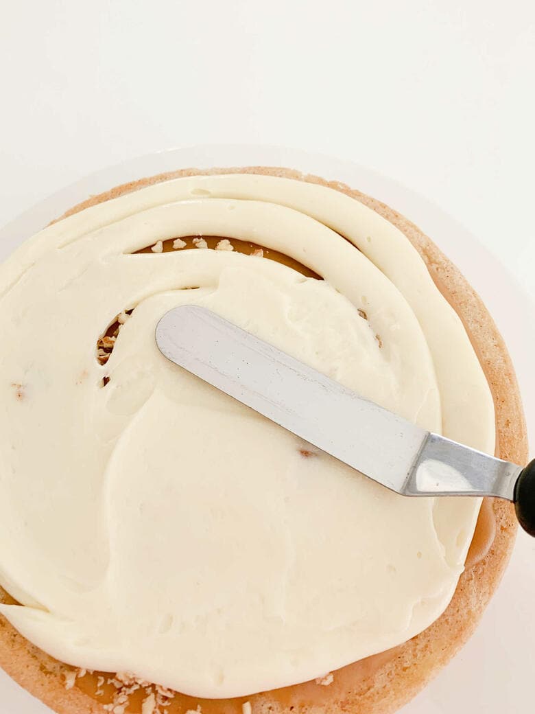 Frosting the Apple Caramel Layer Cake