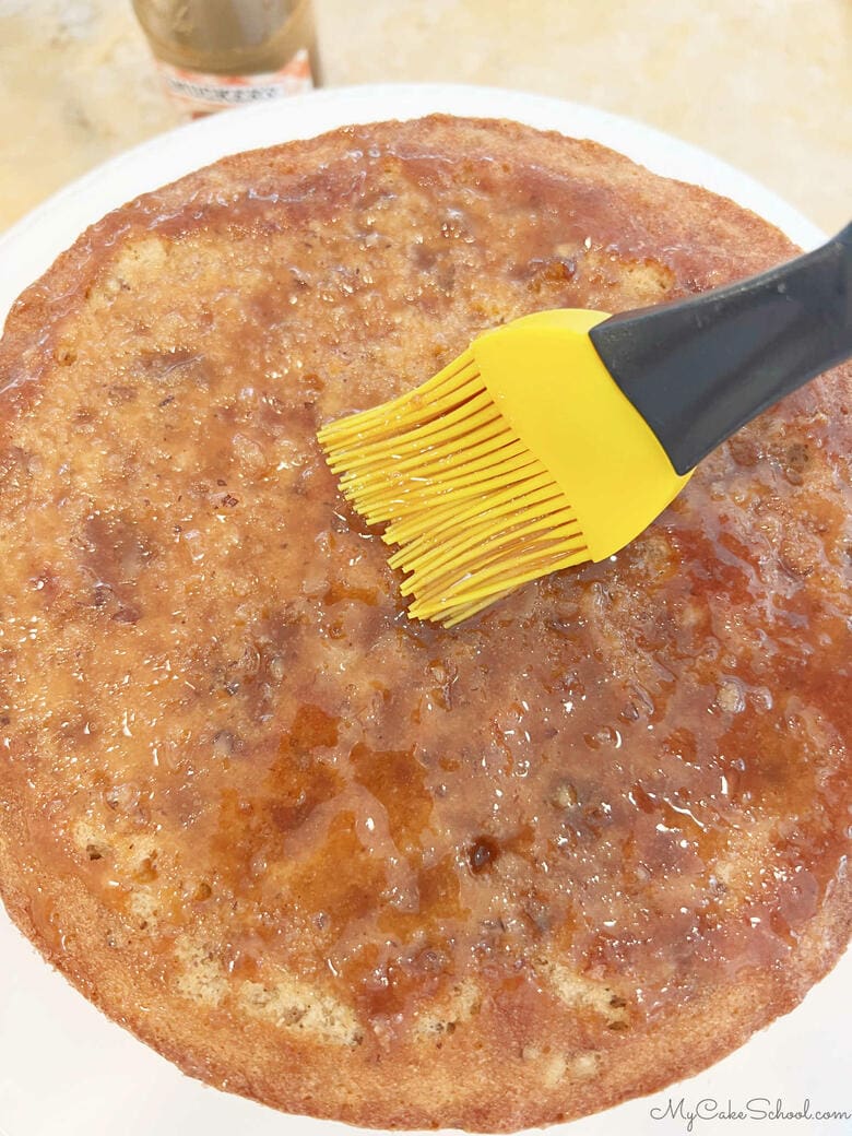 Brushing Caramel onto Cake Layer with Silicone Pastry Brush