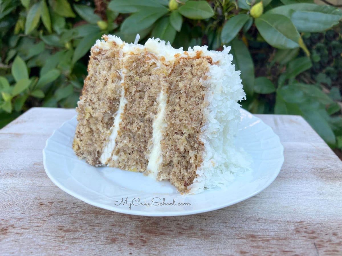 Slice of Coconut Hummingbird Cake