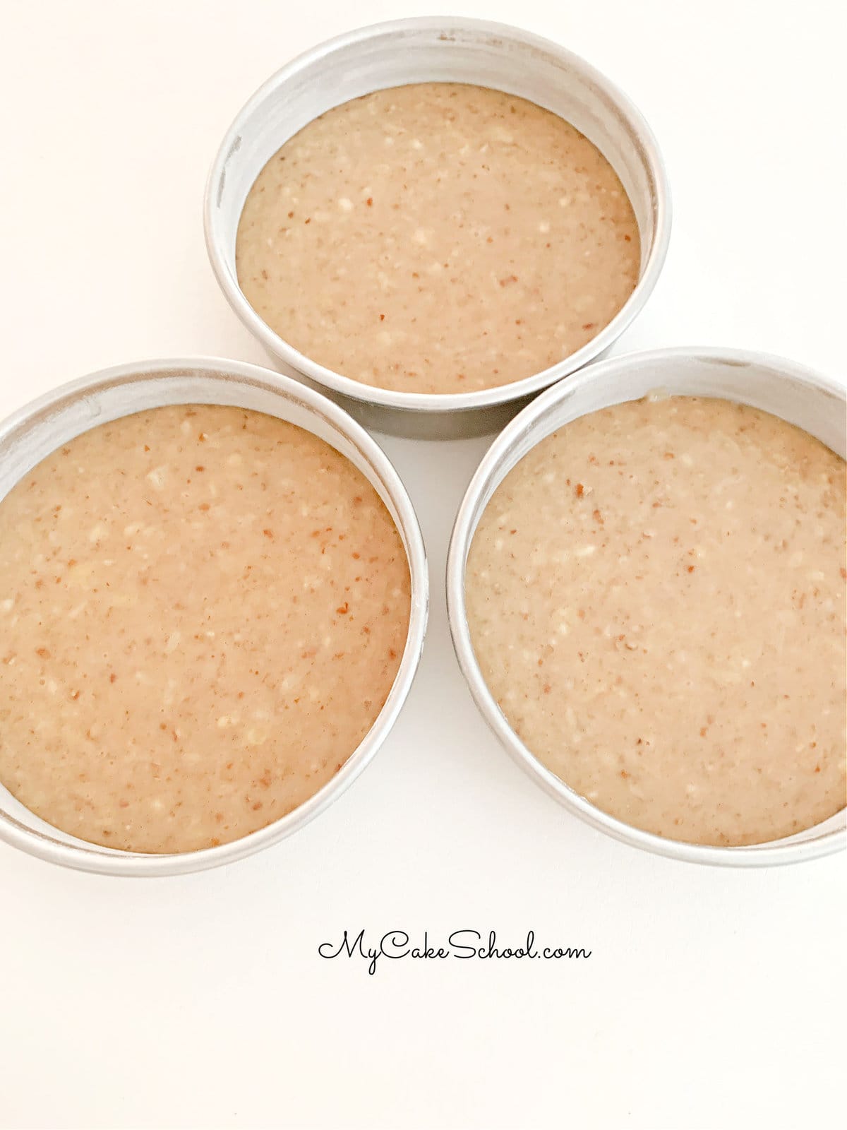 Coconut Hummingbird Cake Batter in Pans