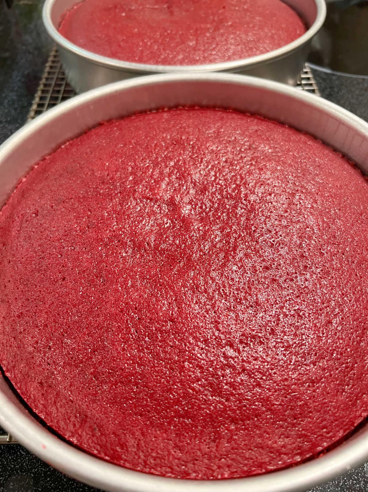 Red Velvet Cake Layers cooling in pans