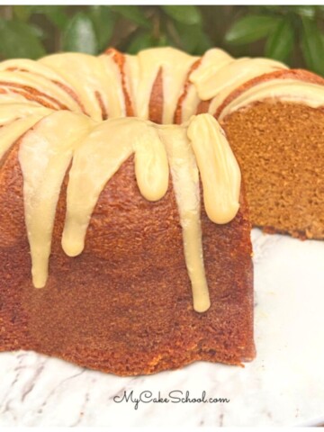 Gingerbread Pound Cake, sliced, on a cake pedestal.
