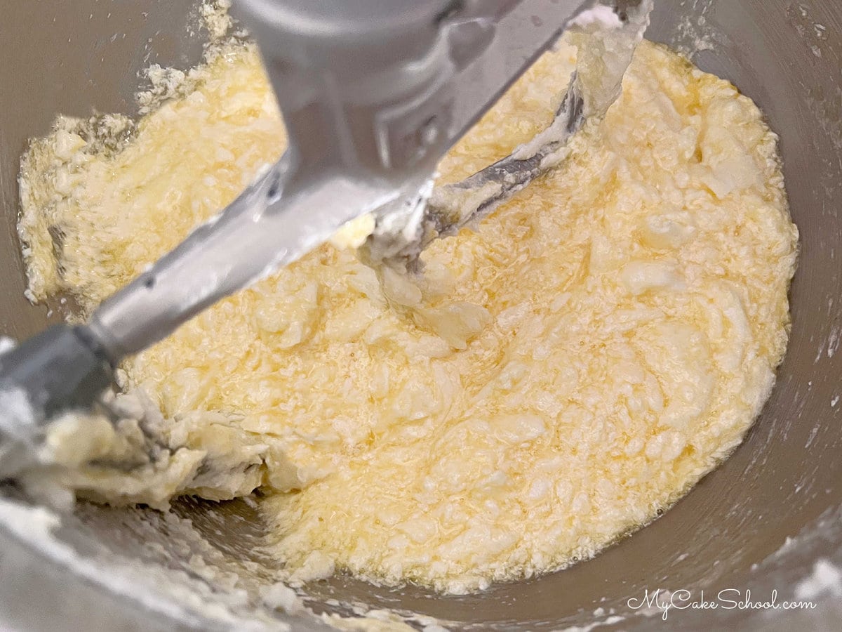 Adding eggs to pound cake batter