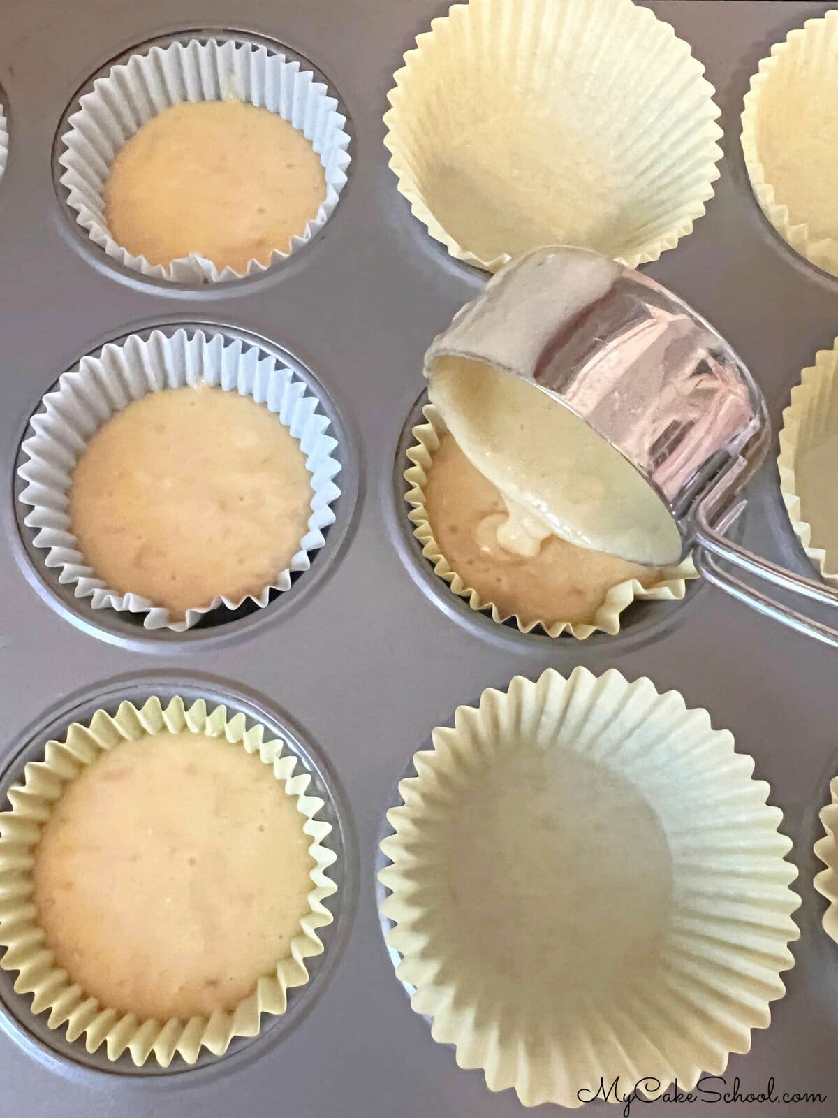 Filling cupcake liners with cake batter