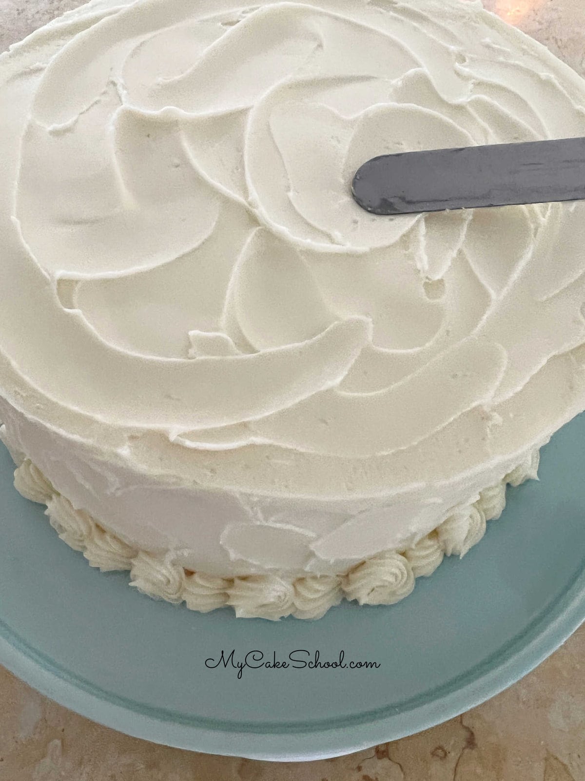 Adding texture to buttercream frosting with offset spatula