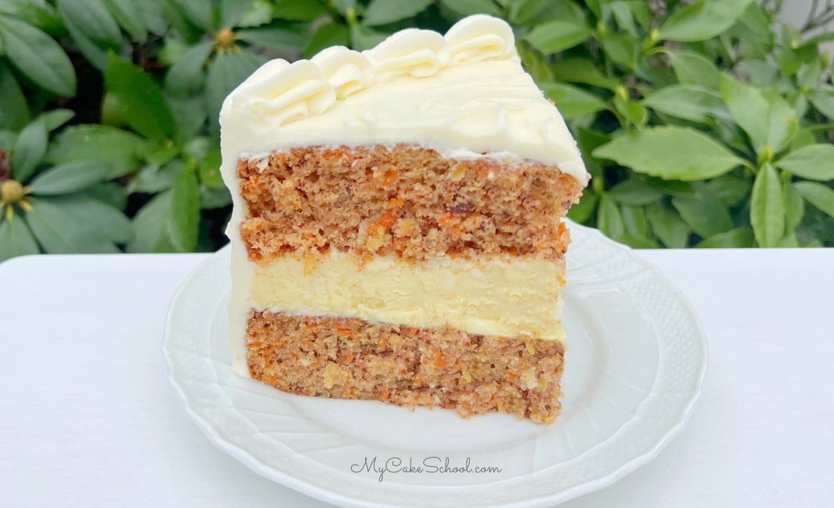 Slice of Carrot Cheesecake Cake on a plate
