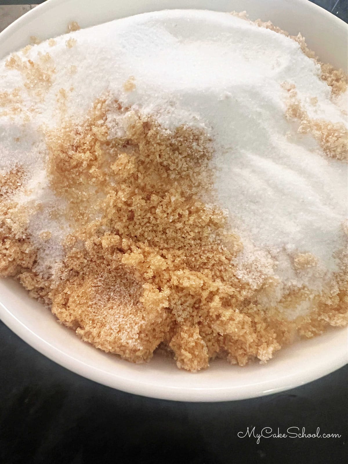 Bowl of Brown and White Sugar