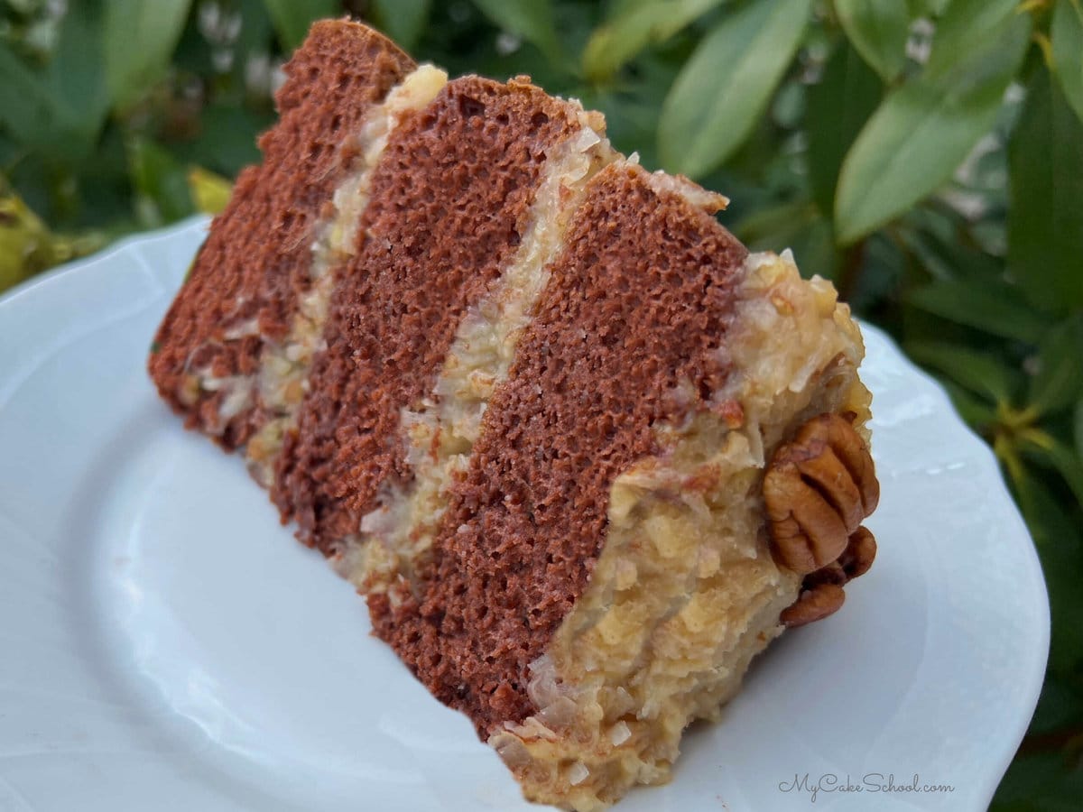 Slice of German Chocolate Cake on a white plate