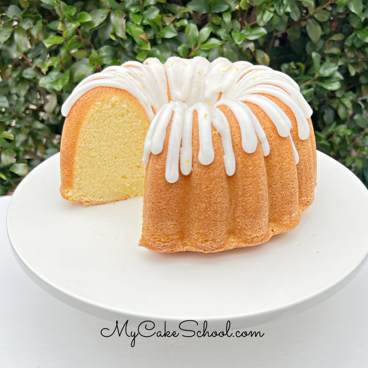 Lemon Bundt Cake on white Pedestal