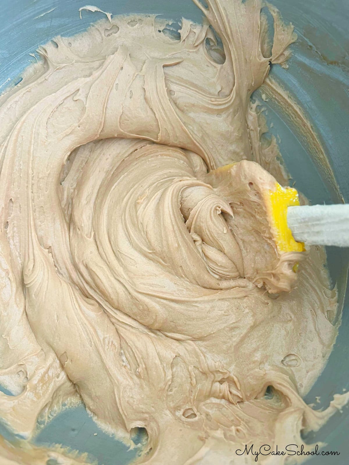 Bowl of Mocha Buttercream with Spatula