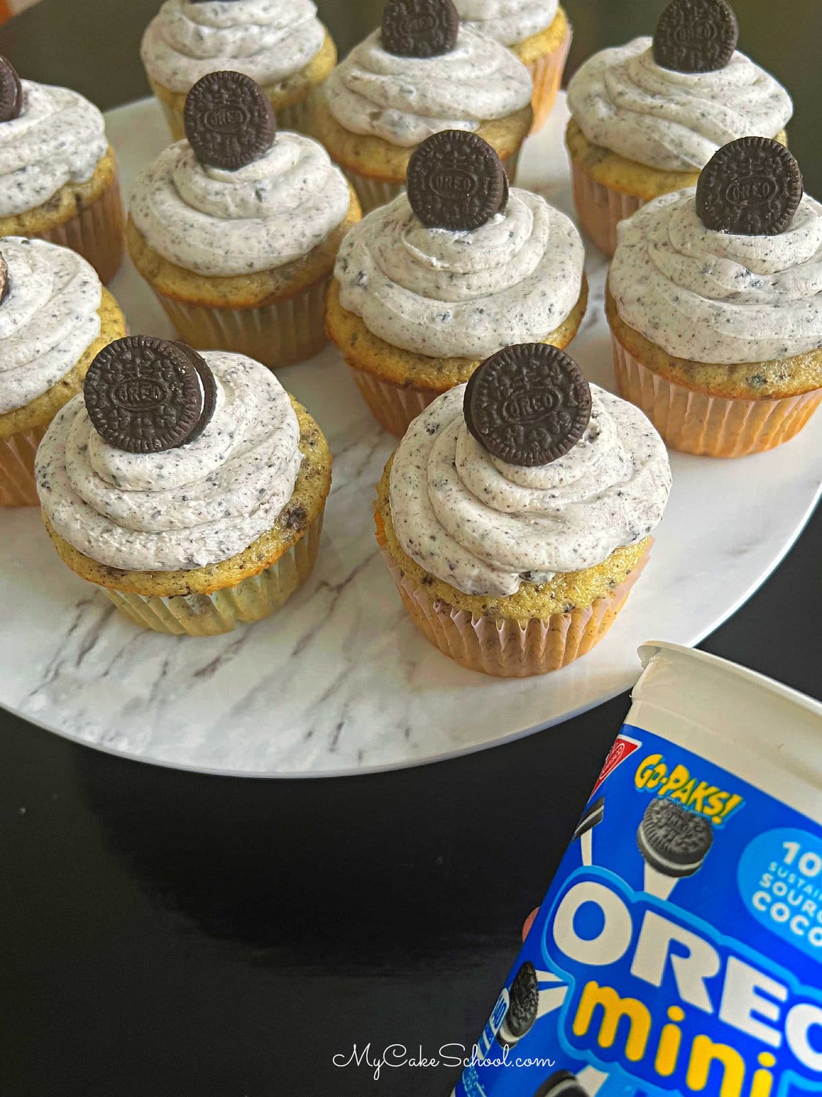 Oreo Cupcakes topped with Mini Oreos