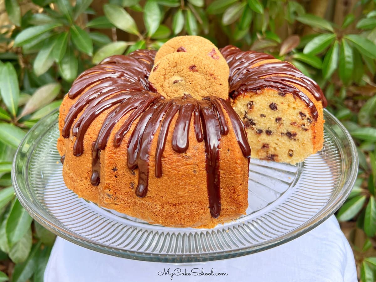 Chocolate Chip Pound Cake, sliced, on a pedestal