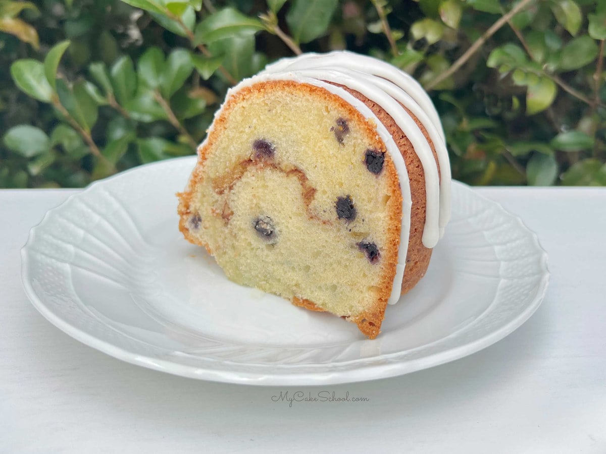 Slice of Blueberry Bundt Cake on a plate