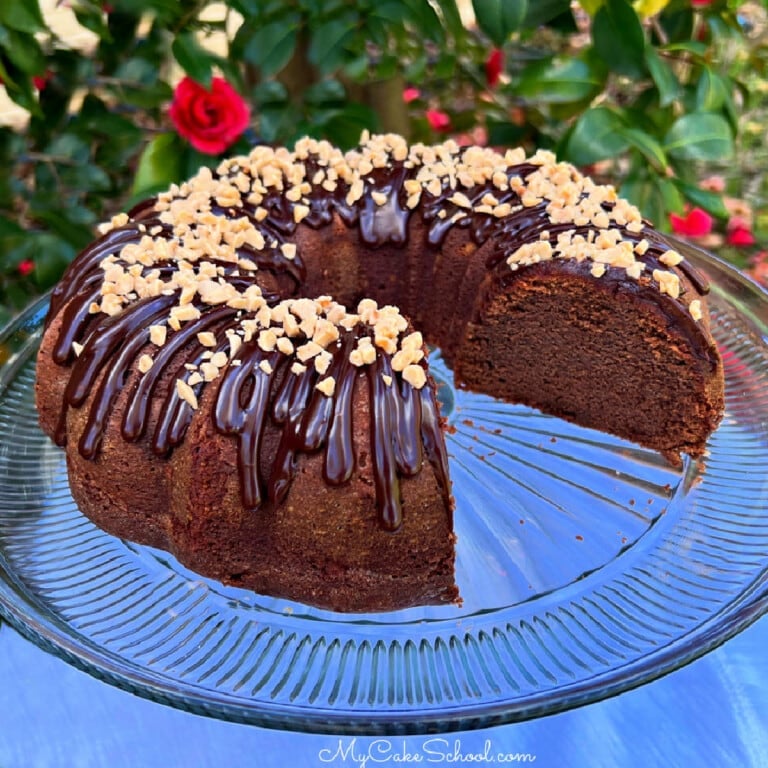 Sliced Irish Cream Cake on pedestal