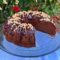 Sliced Irish Cream Bundt Cake on glass pedestal