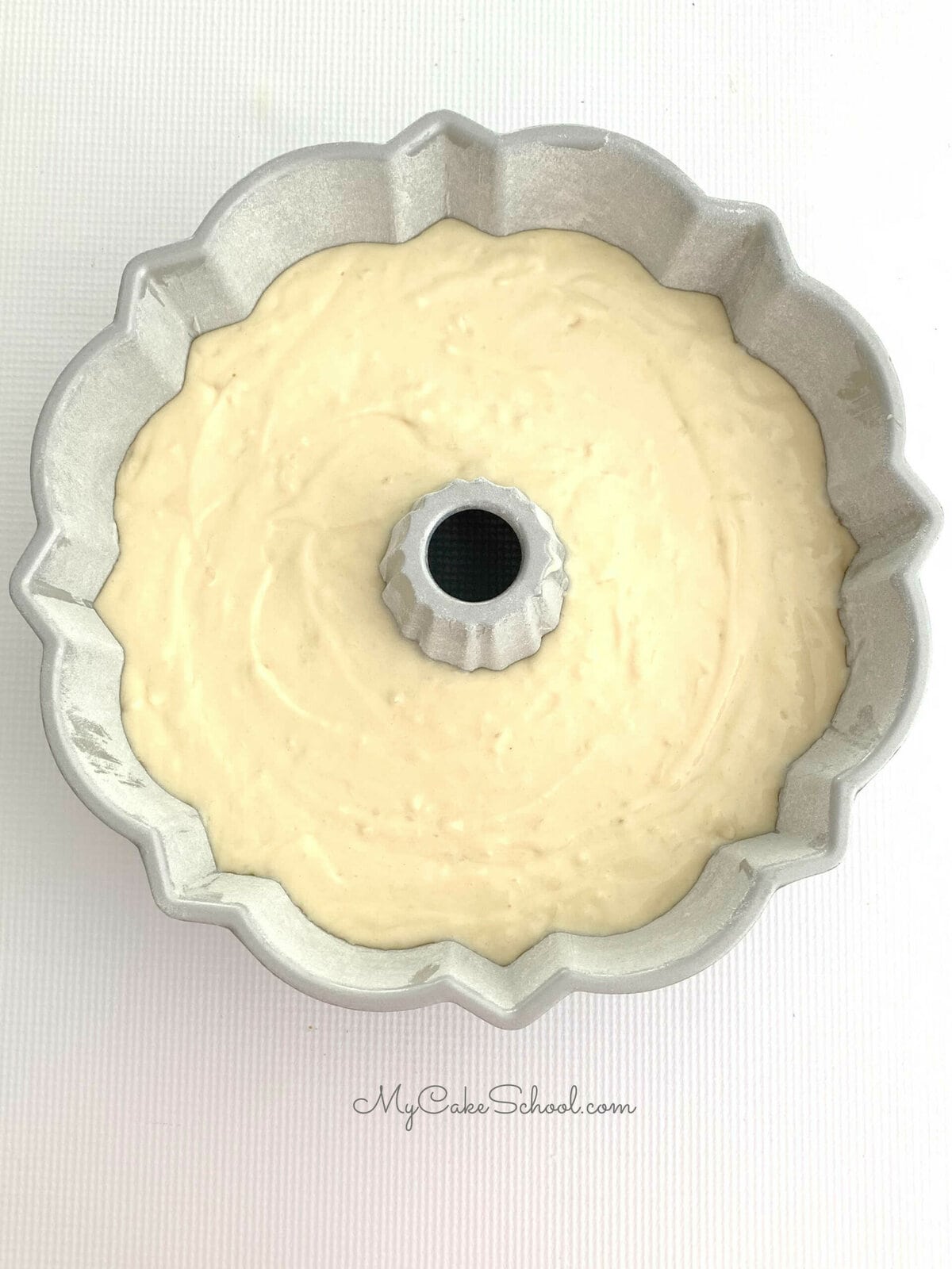 Bundt pan filled with Almond Coconut Batter