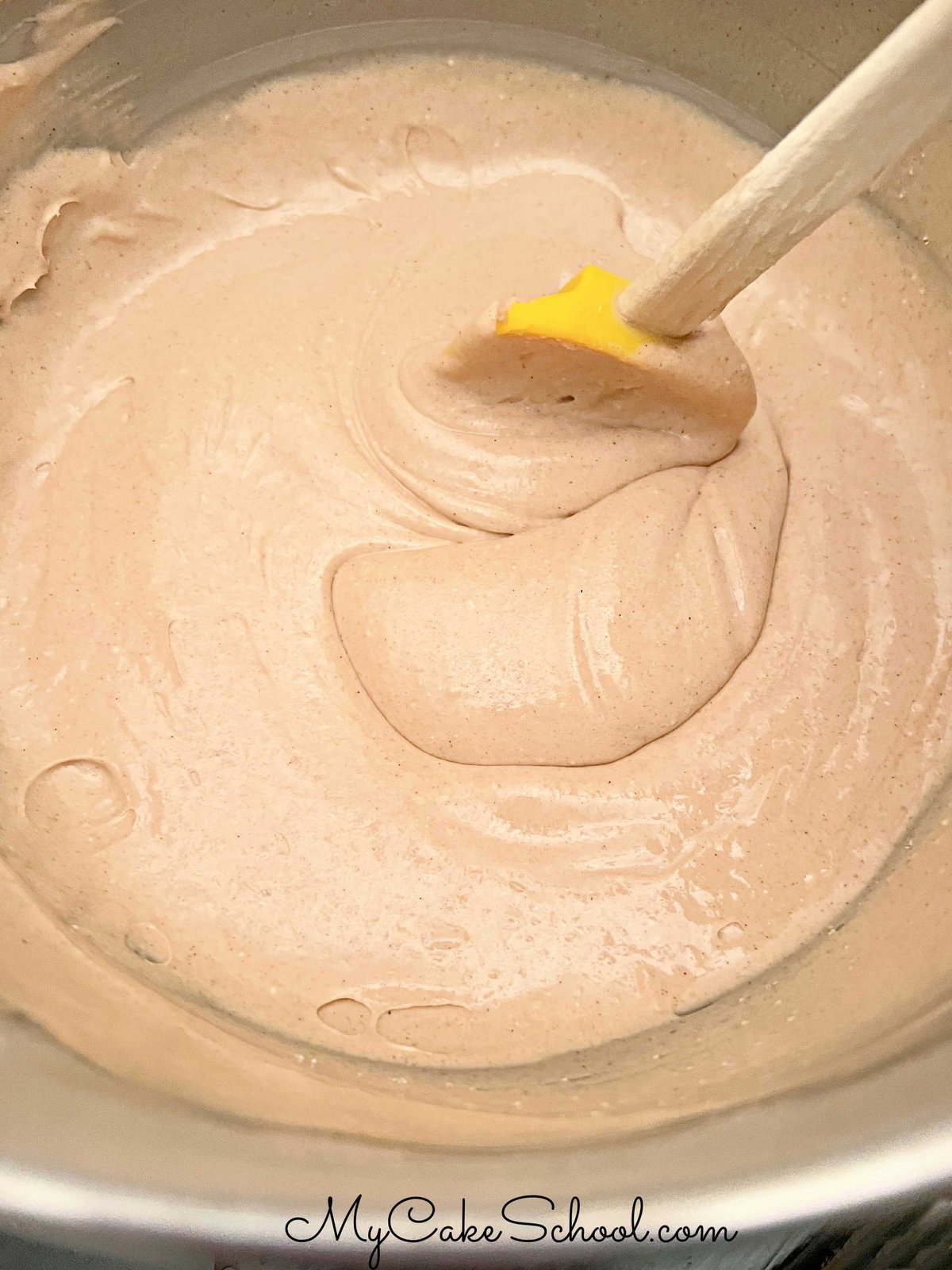 Mixing bowl of batter for carrot cupcakes