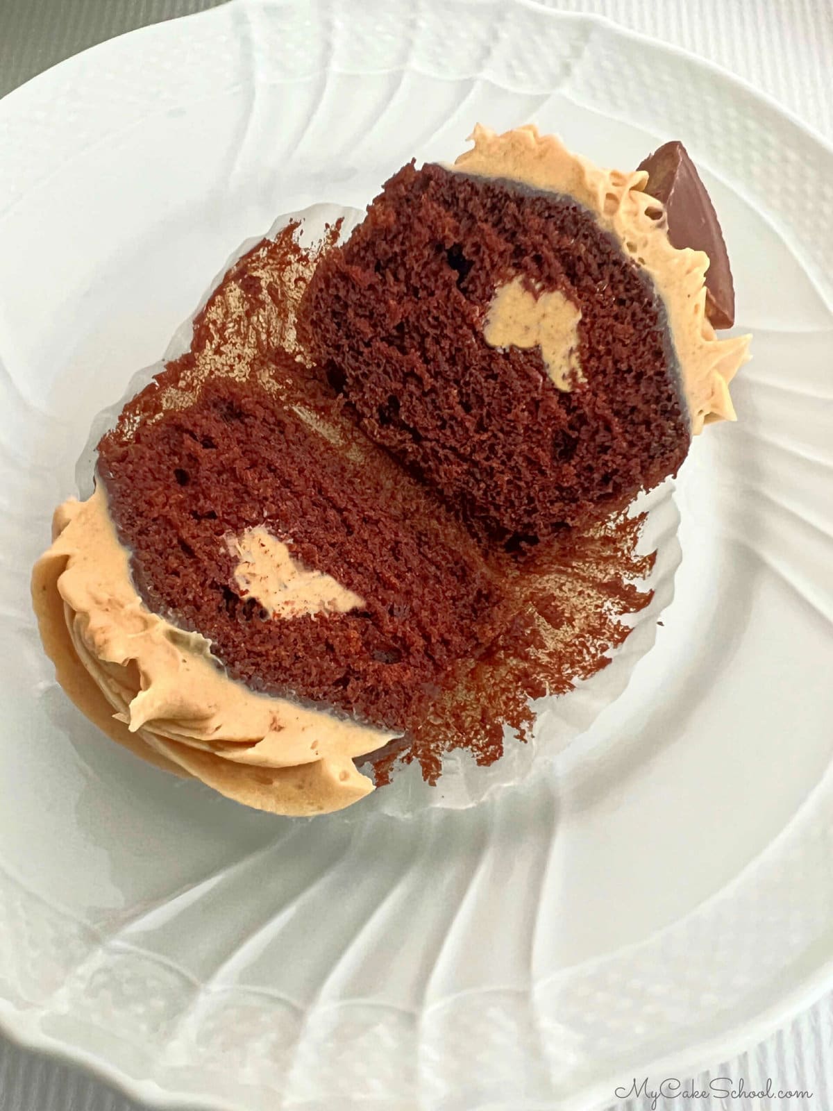 Filled Chocolate Peanut Butter Cupcake, sliced in half
