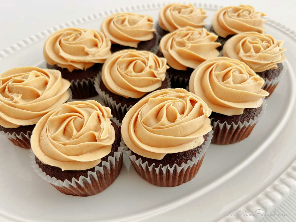 Chocolate Cupcakes swirled with Peanut Butter Buttercream on a white platter