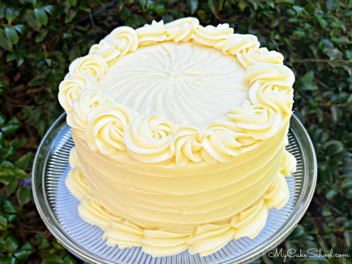 Lemon Cream Cake on glass pedestal