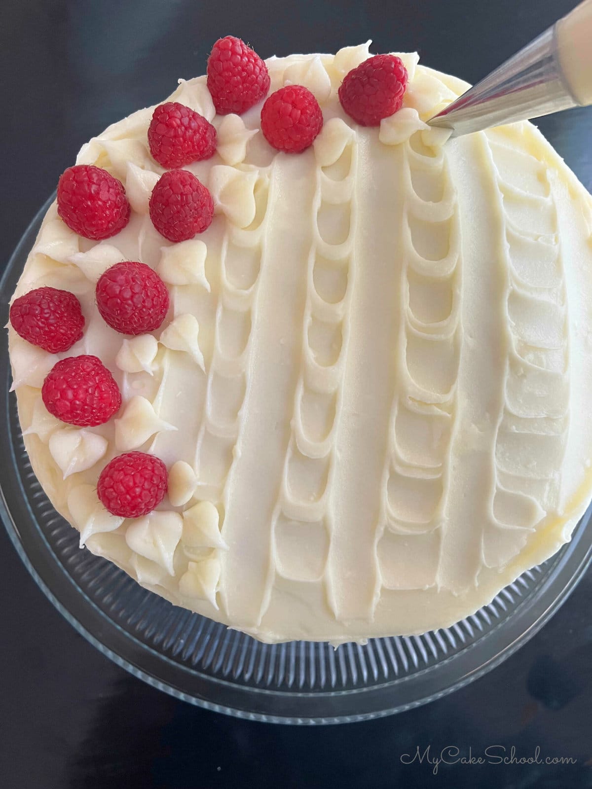 Decorating the Raspberry Cake