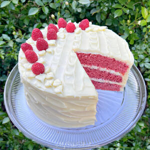 Sliced Raspberry Cake on a pedestal