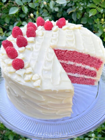 Sliced Raspberry Cake on a pedestal