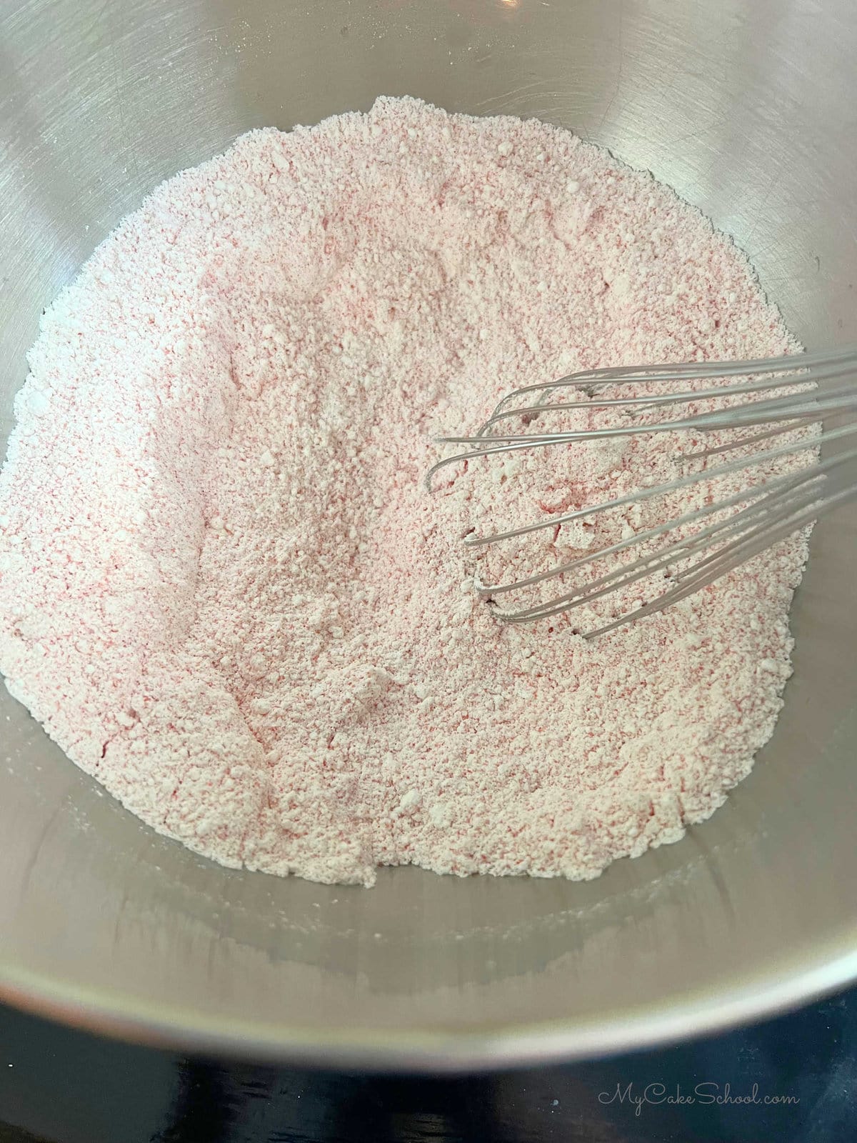 Bowl of dry ingredients for Raspberry Cake Mix Recipe