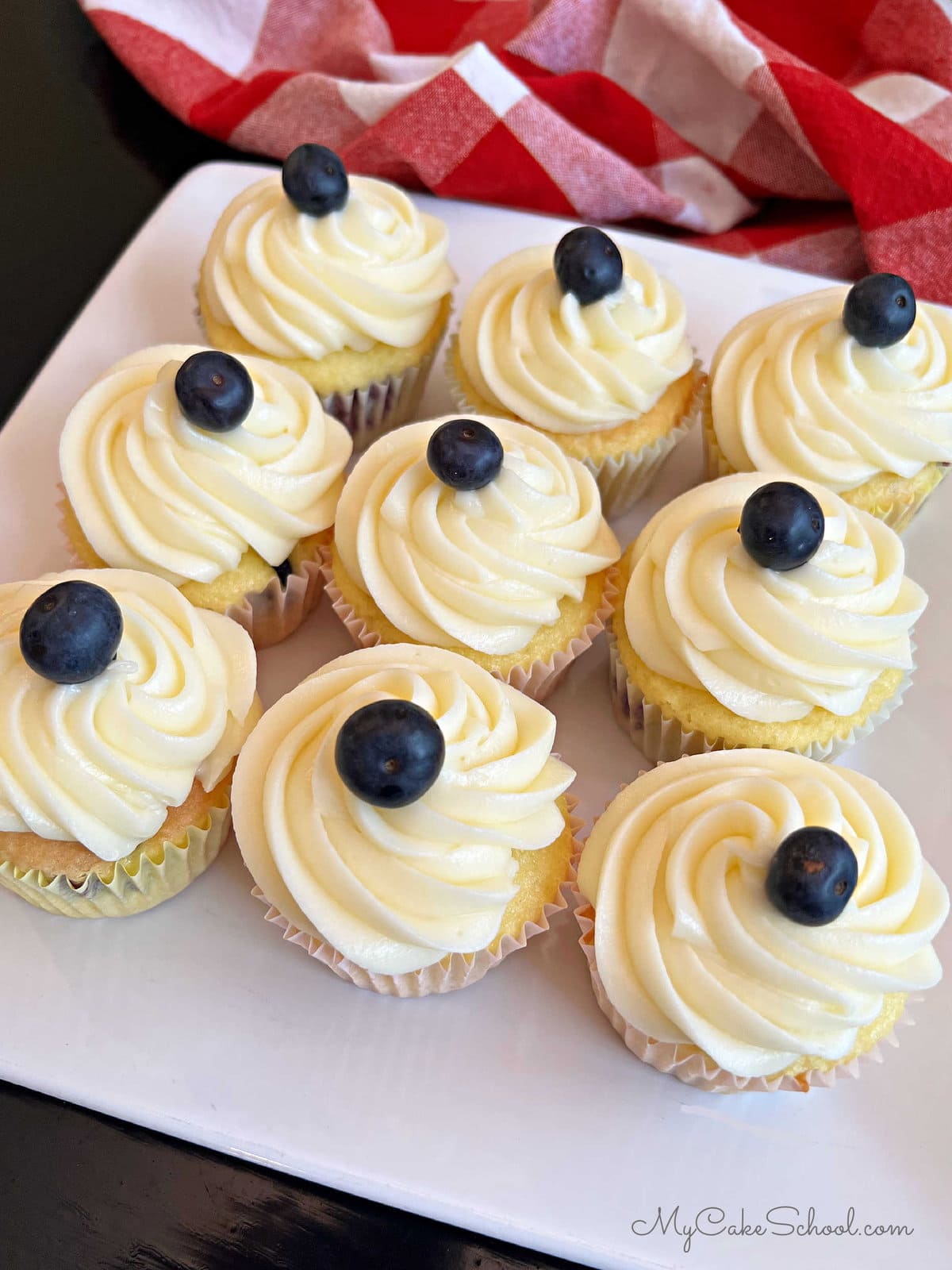 Lemon Blueberry Cupcakes on a white platter