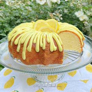 Sliced Lemonade Cake on pedestal