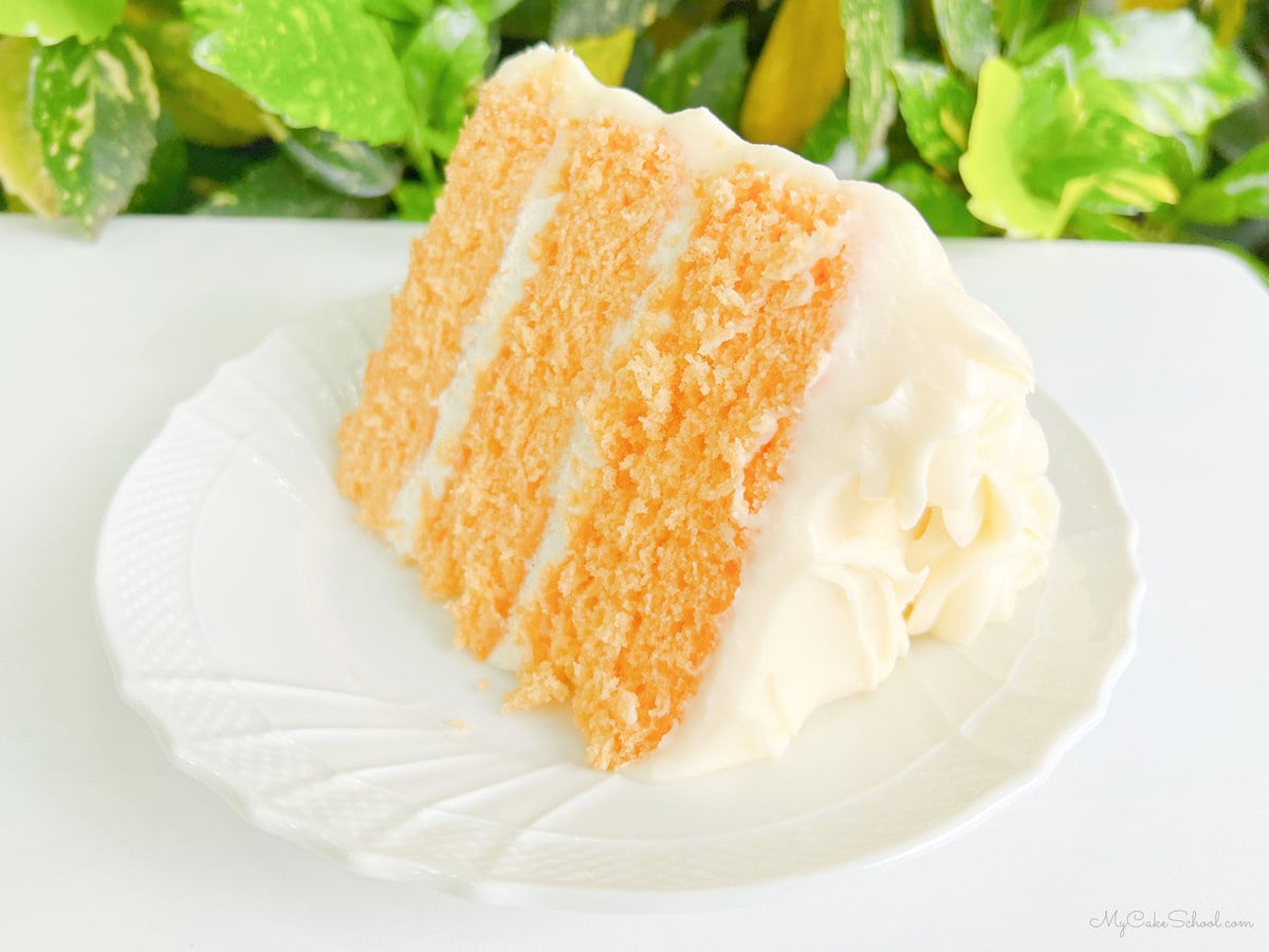 Slice of Orange Cake on white plate