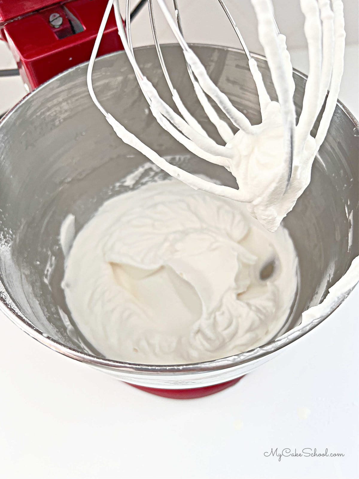Whipped Cream in the mixing bowl with whisk attachment