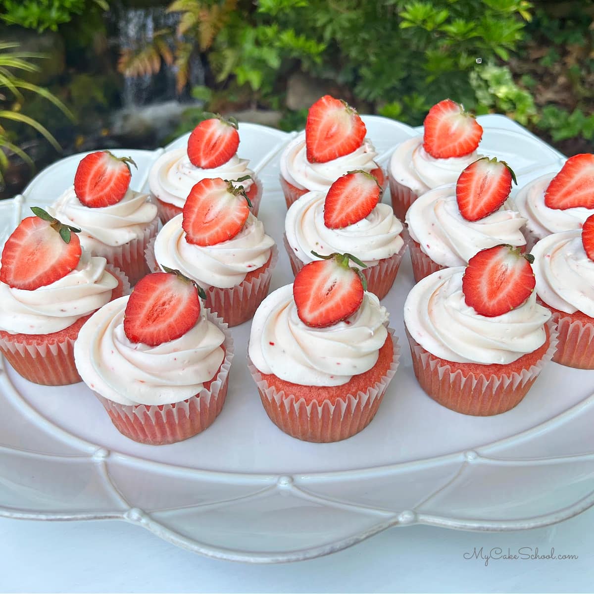 Strawberry cupcakes on a platter