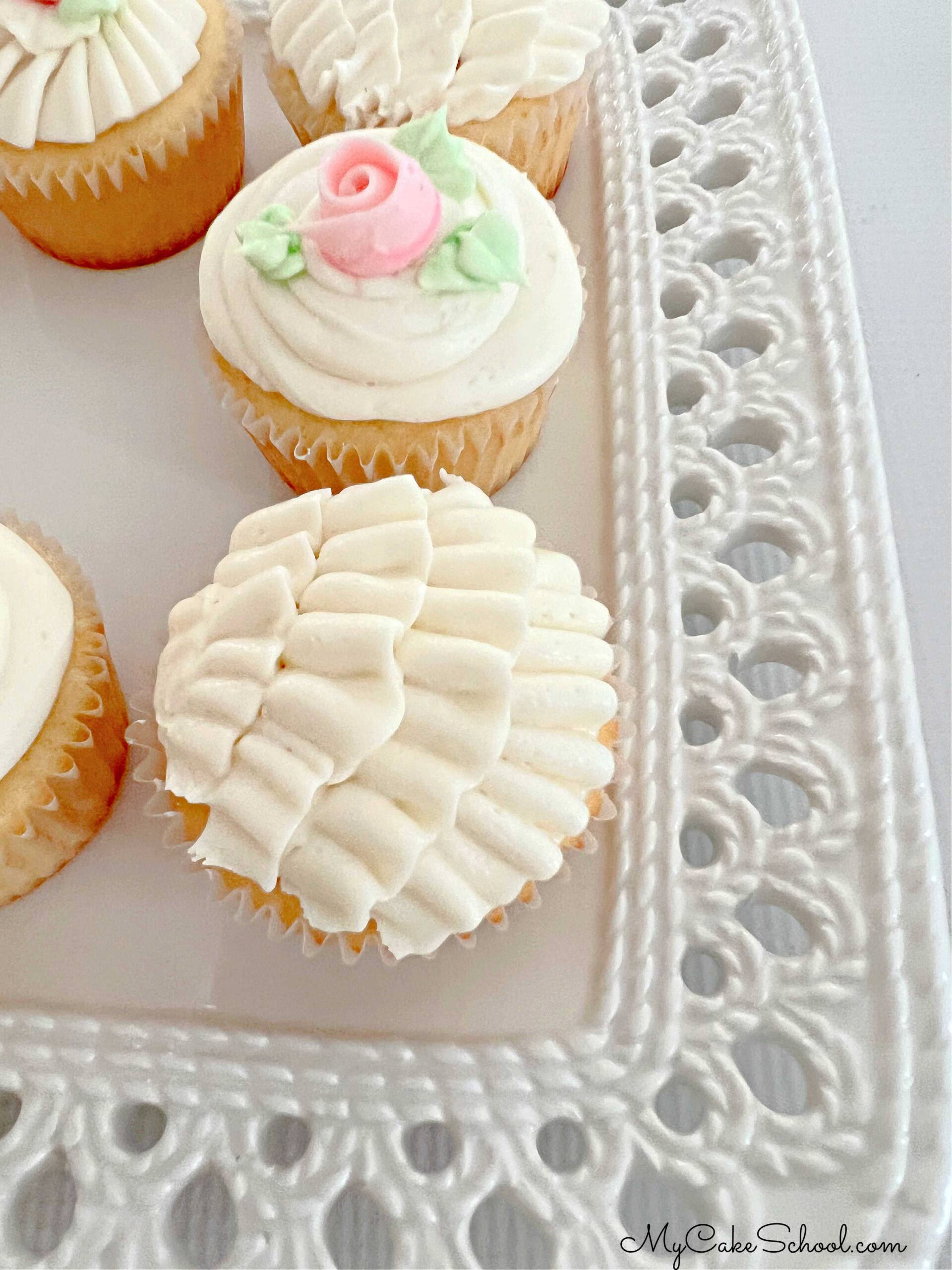 Vanilla Cupcake topped with buttercream ruffles