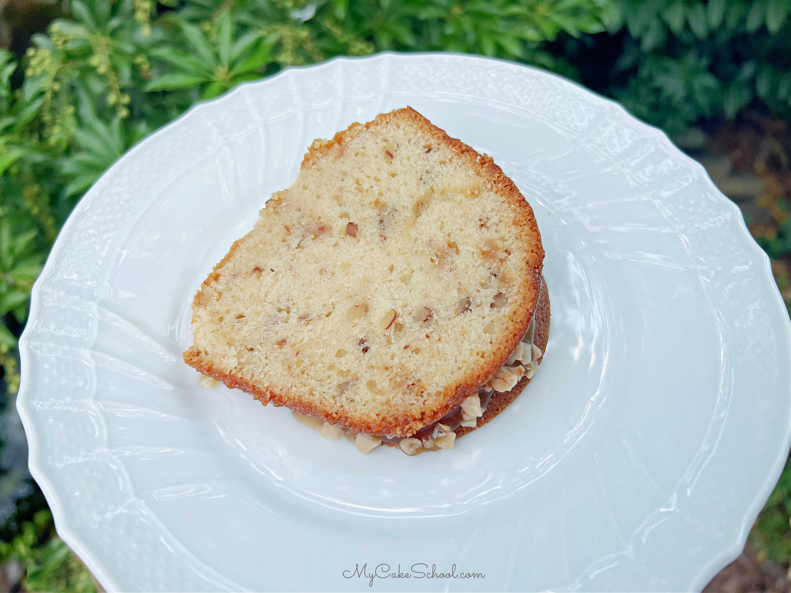 Slice of Toffee Pecan Bundt Cake on a plate