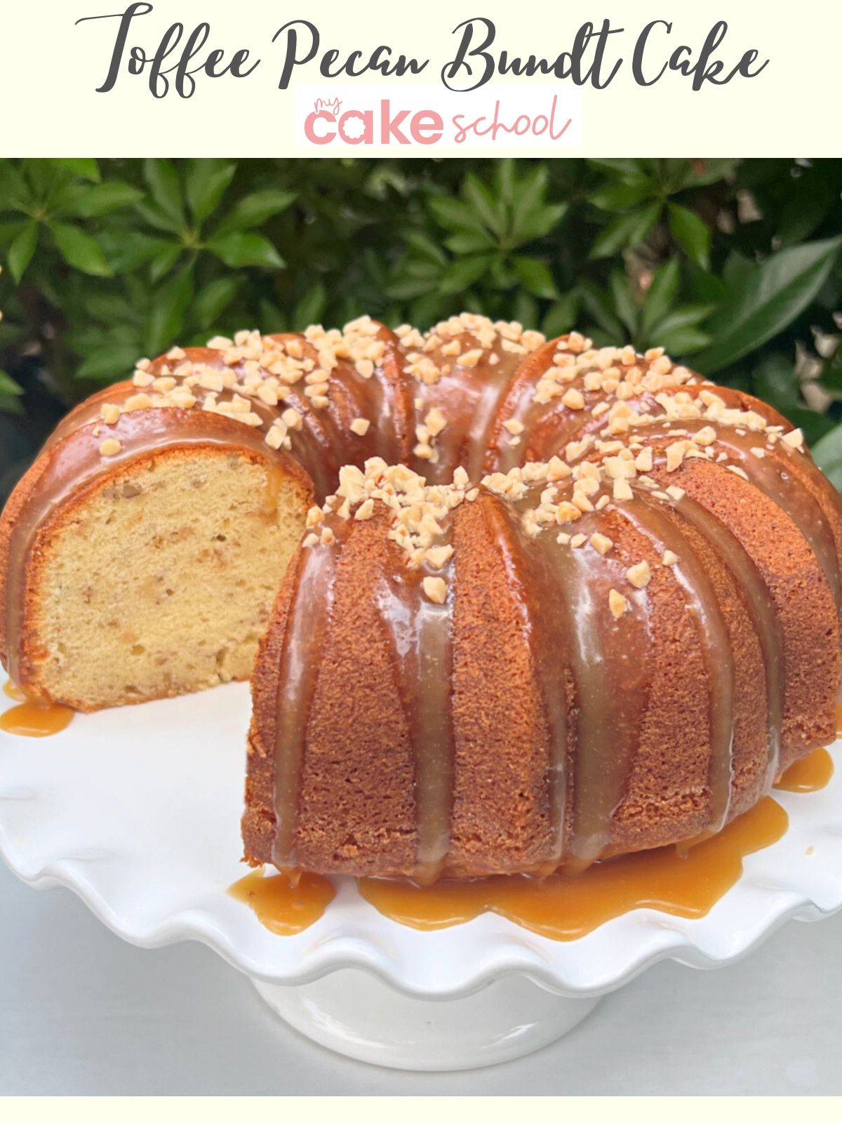 Sliced Toffee Pecan Bundt Cake on white pedestal.