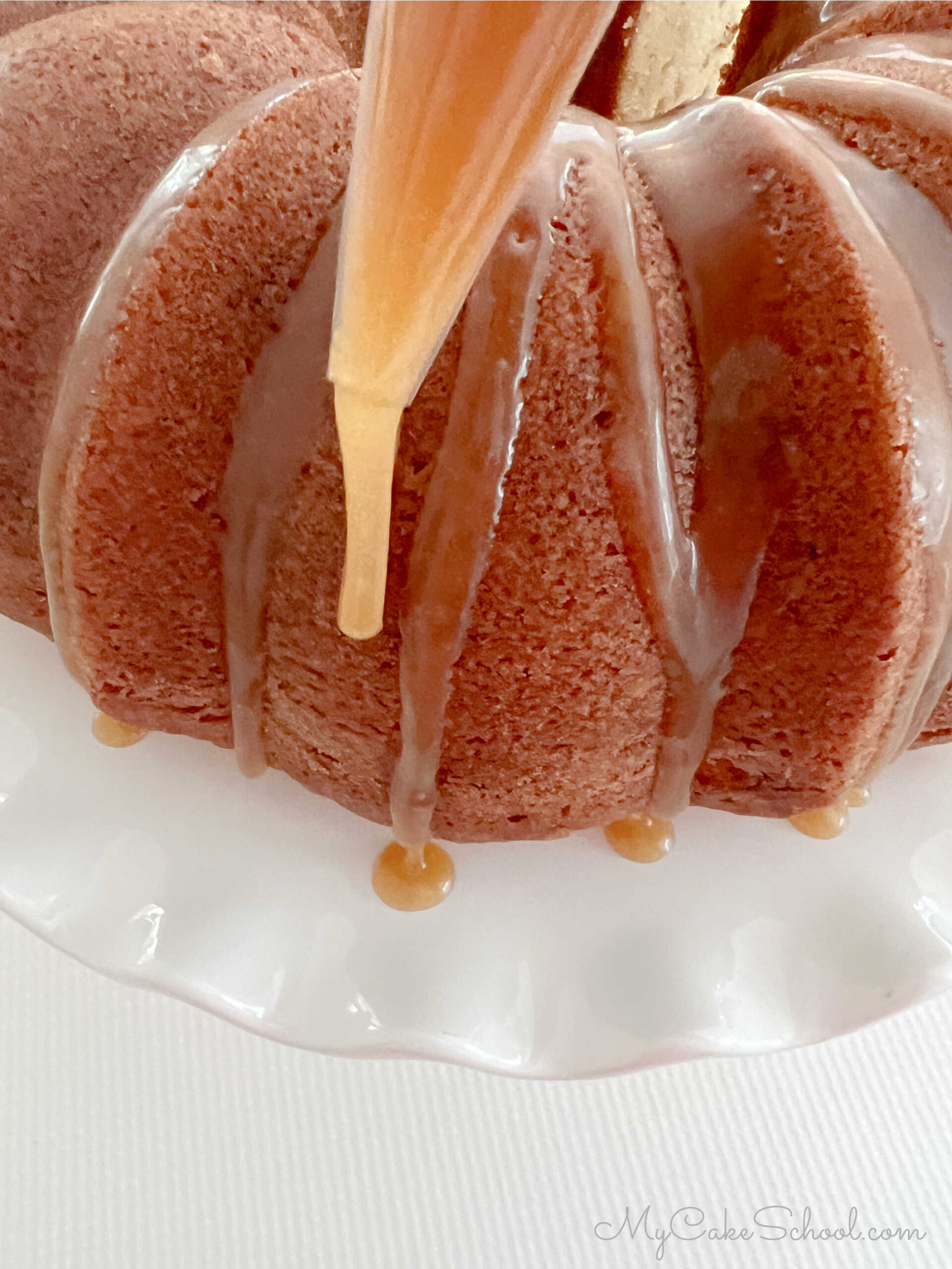 Glazing the toffee cake with caramel