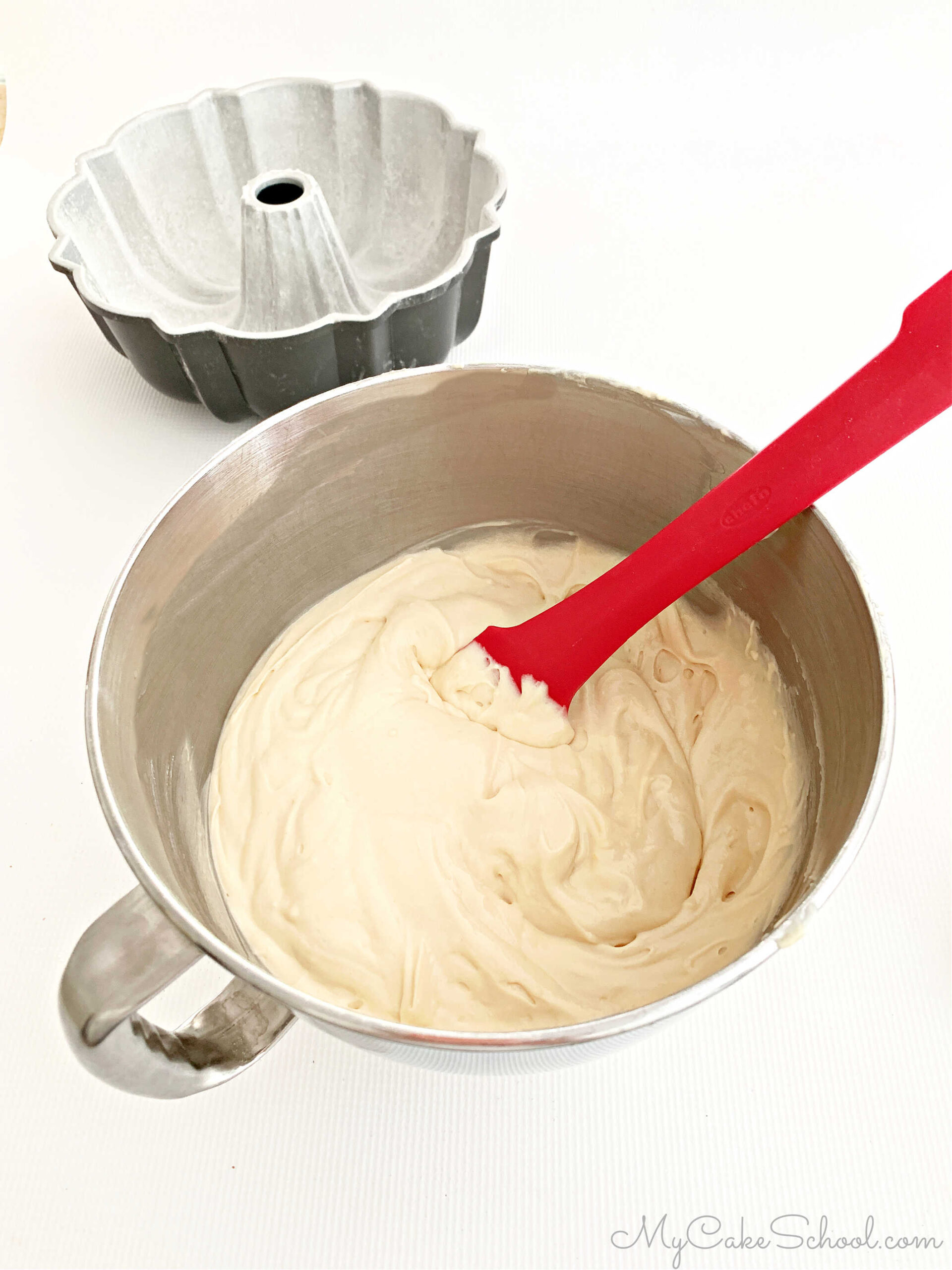 Bowl of cake batter for the Toffee Pecan Cake recipe