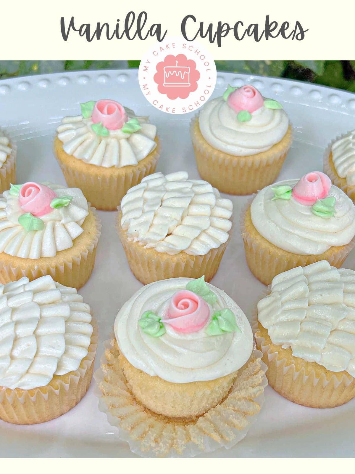 Platter of Vanilla Cupcakes, frosted with vanilla buttercream, topped with buttercream roses.