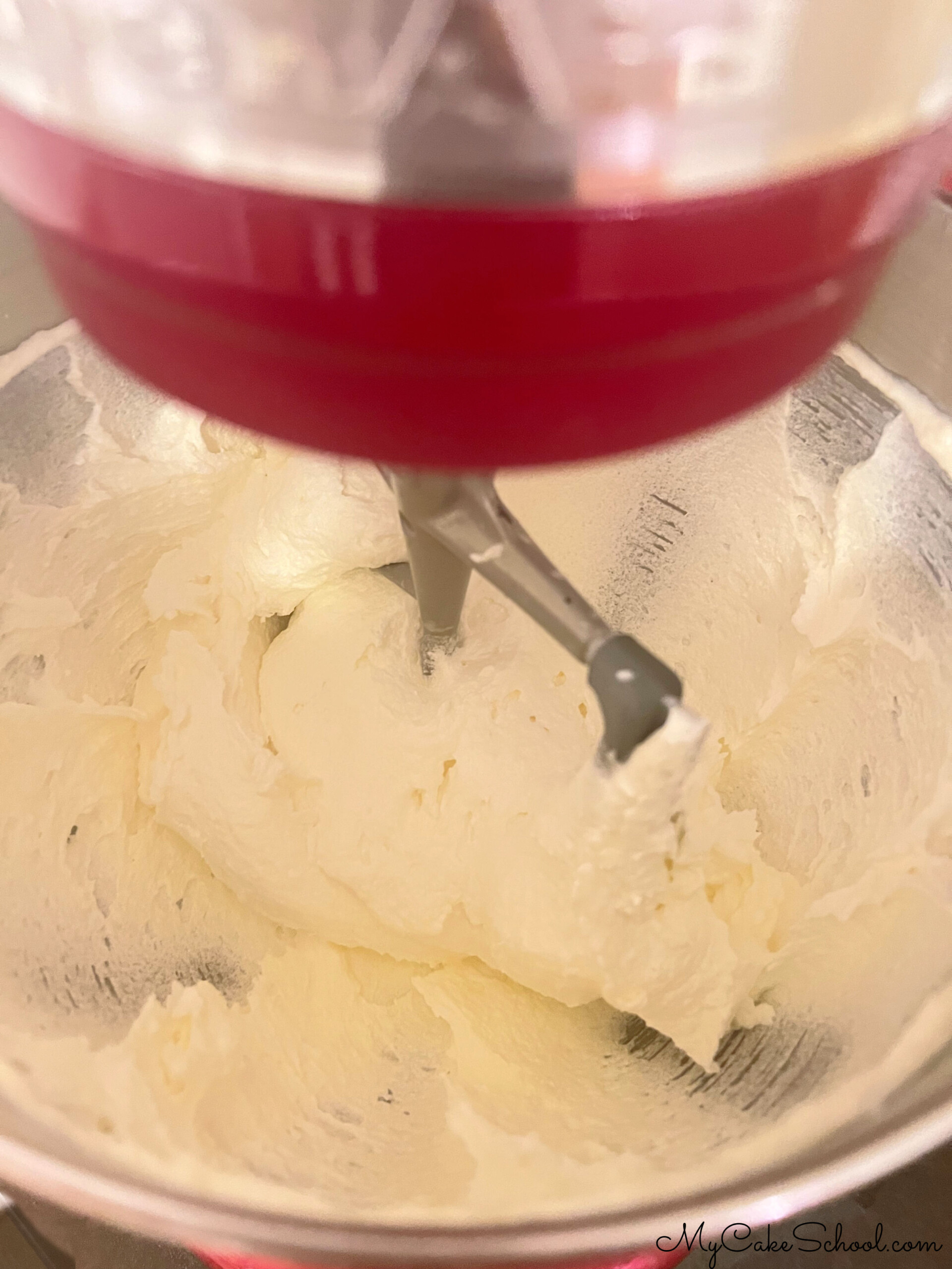 Cream Cheese and Butter Mixture in a mixing bowl, with paddle attachment.