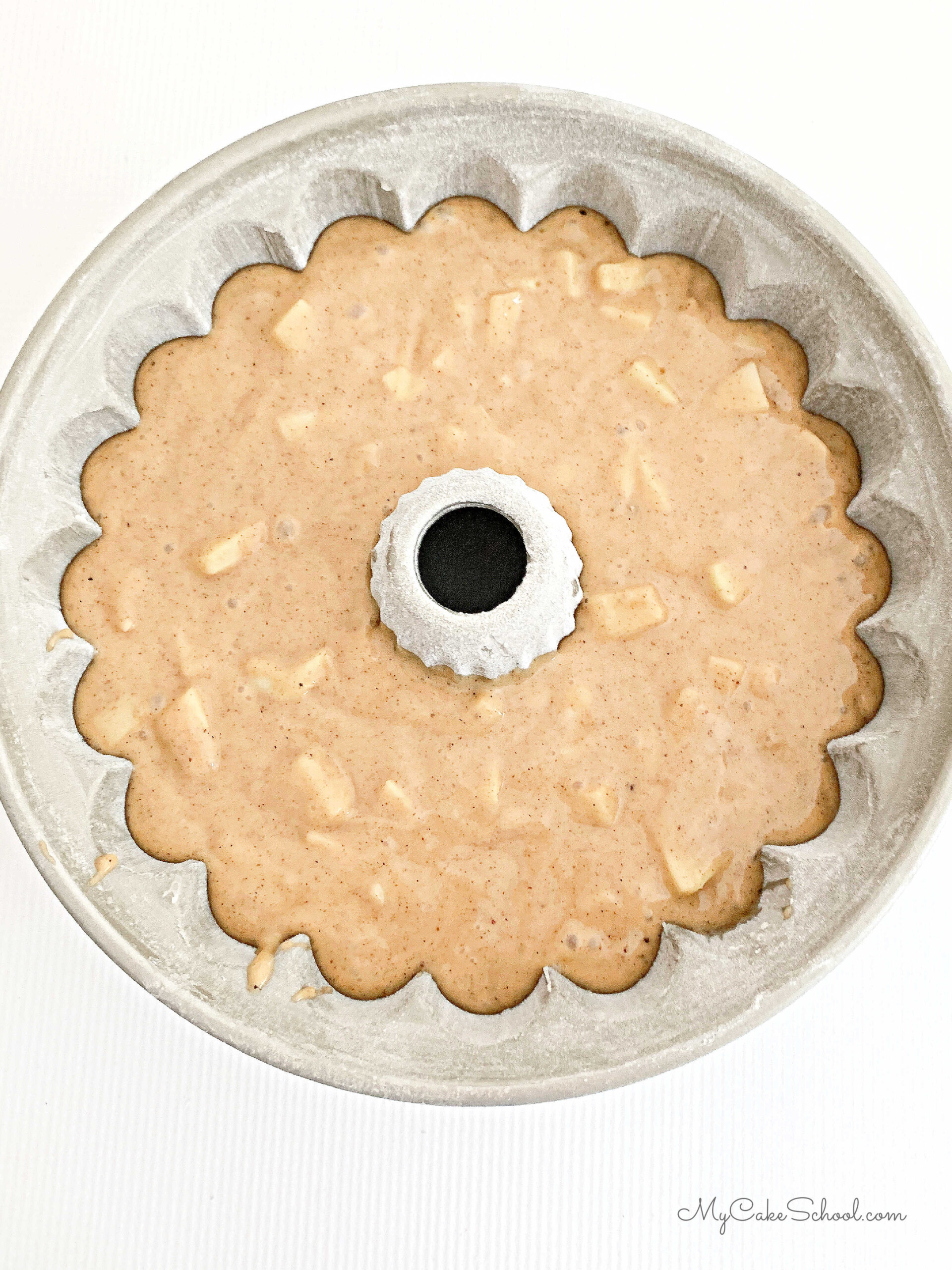 Bundt Pan filled with Apple Bundt Cake Batter.