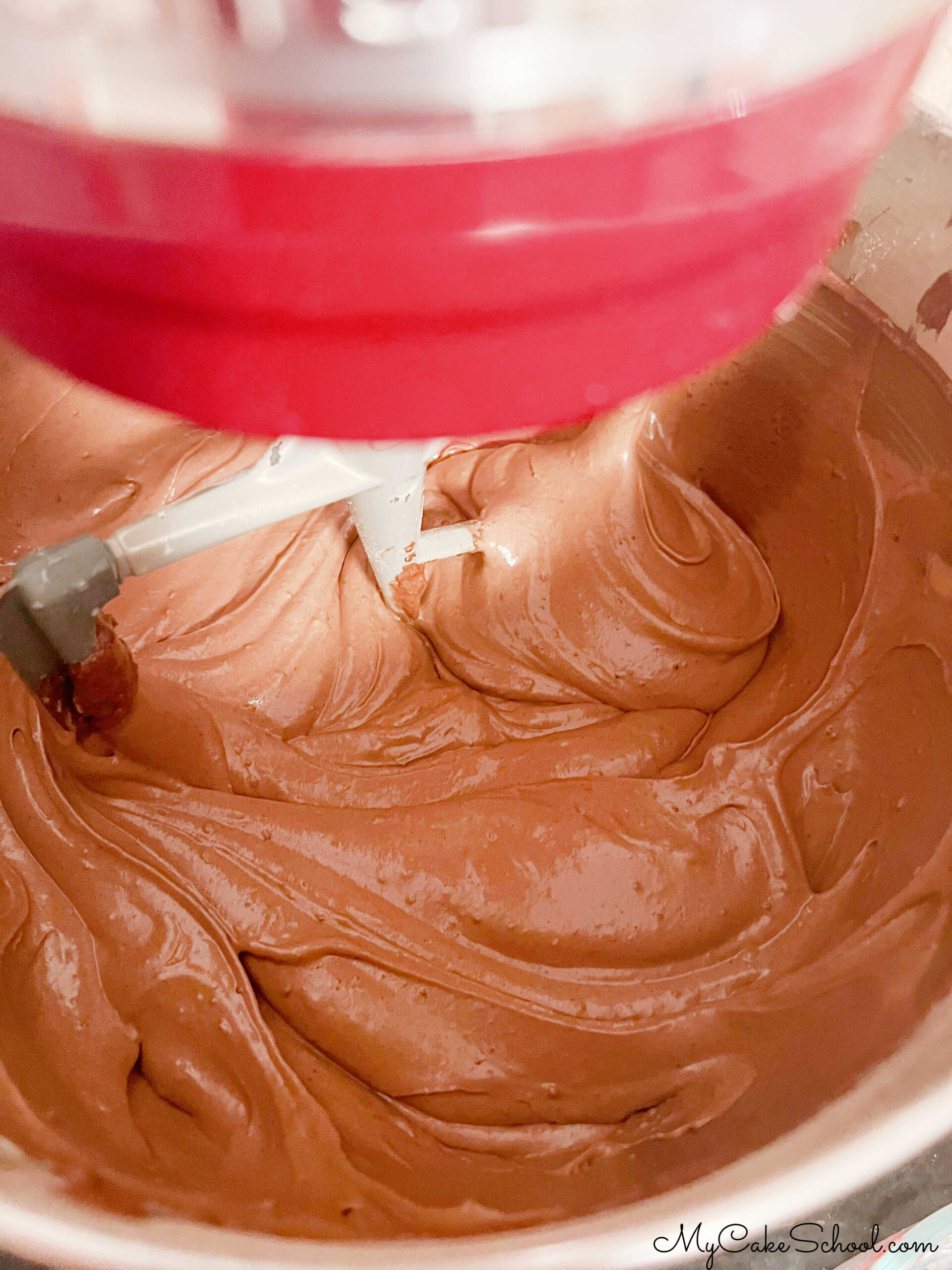 Chocolate bundt cake batter in mixing bowl.