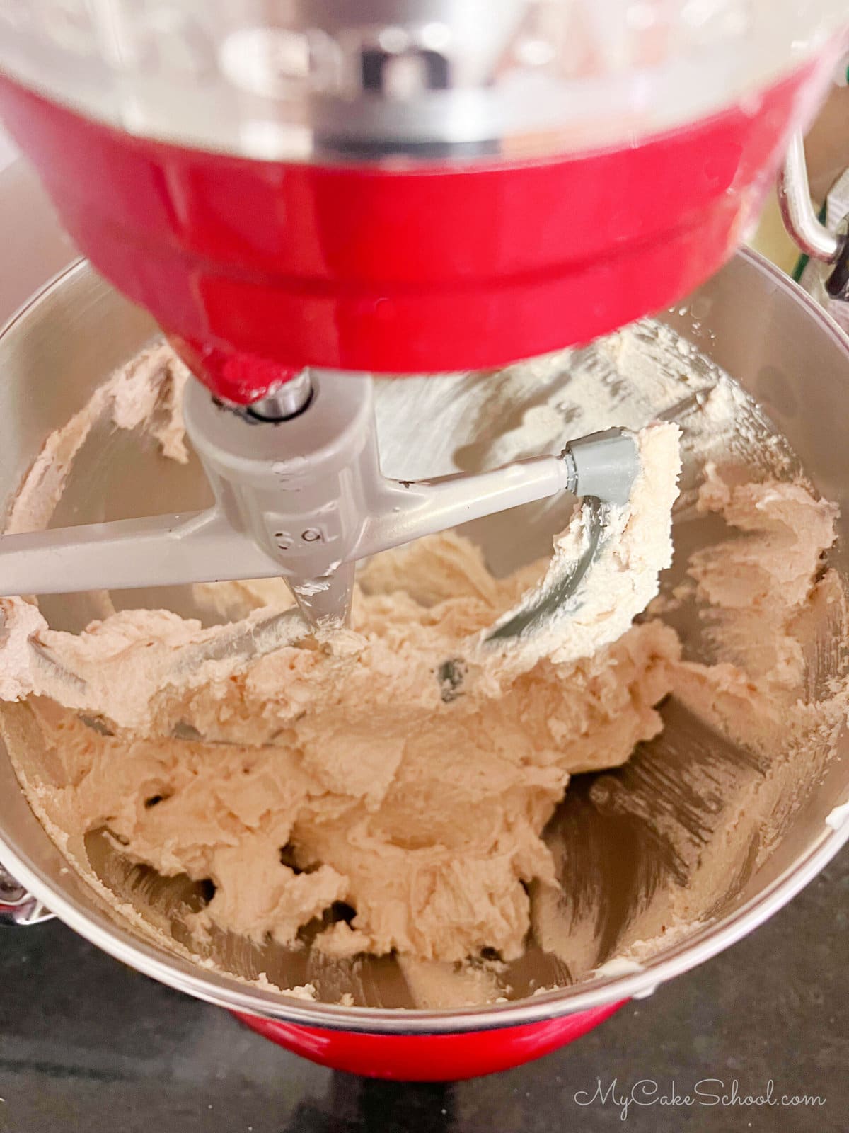 Mixture of brown sugar, white sugar, and butter for maple pound cake.