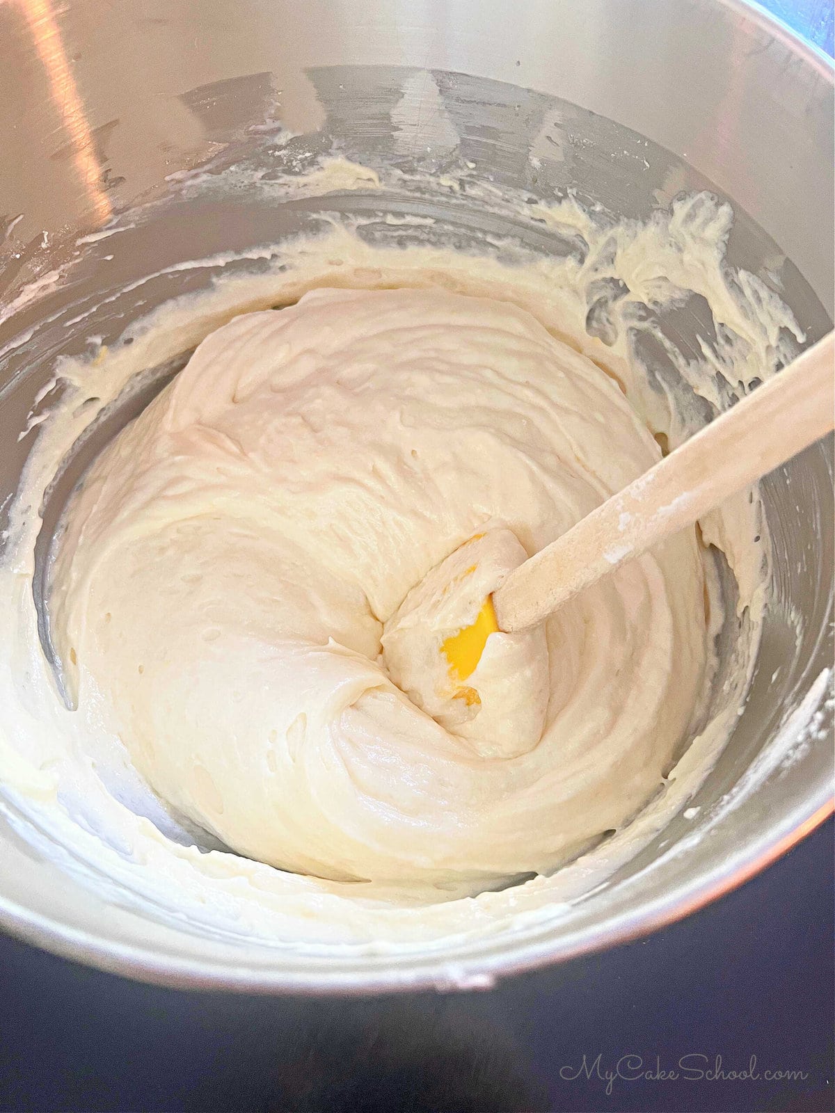Cake batter in mixing bowl.