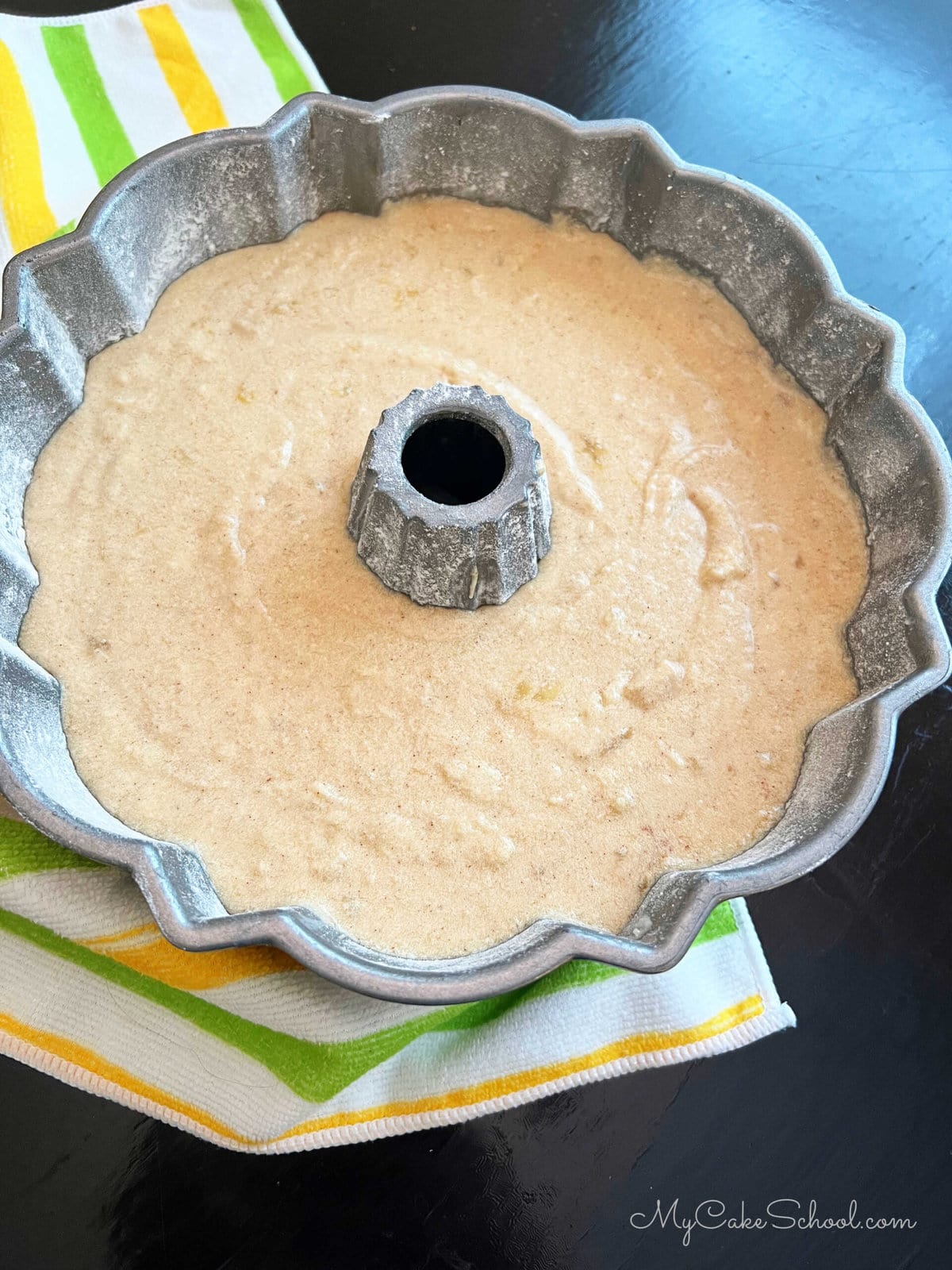 Banana Pound Cake Batter in a Bundt Cake Pan.