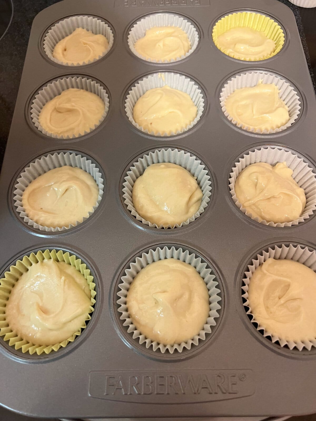 Caramel Cupcake batter in cupcake pans.