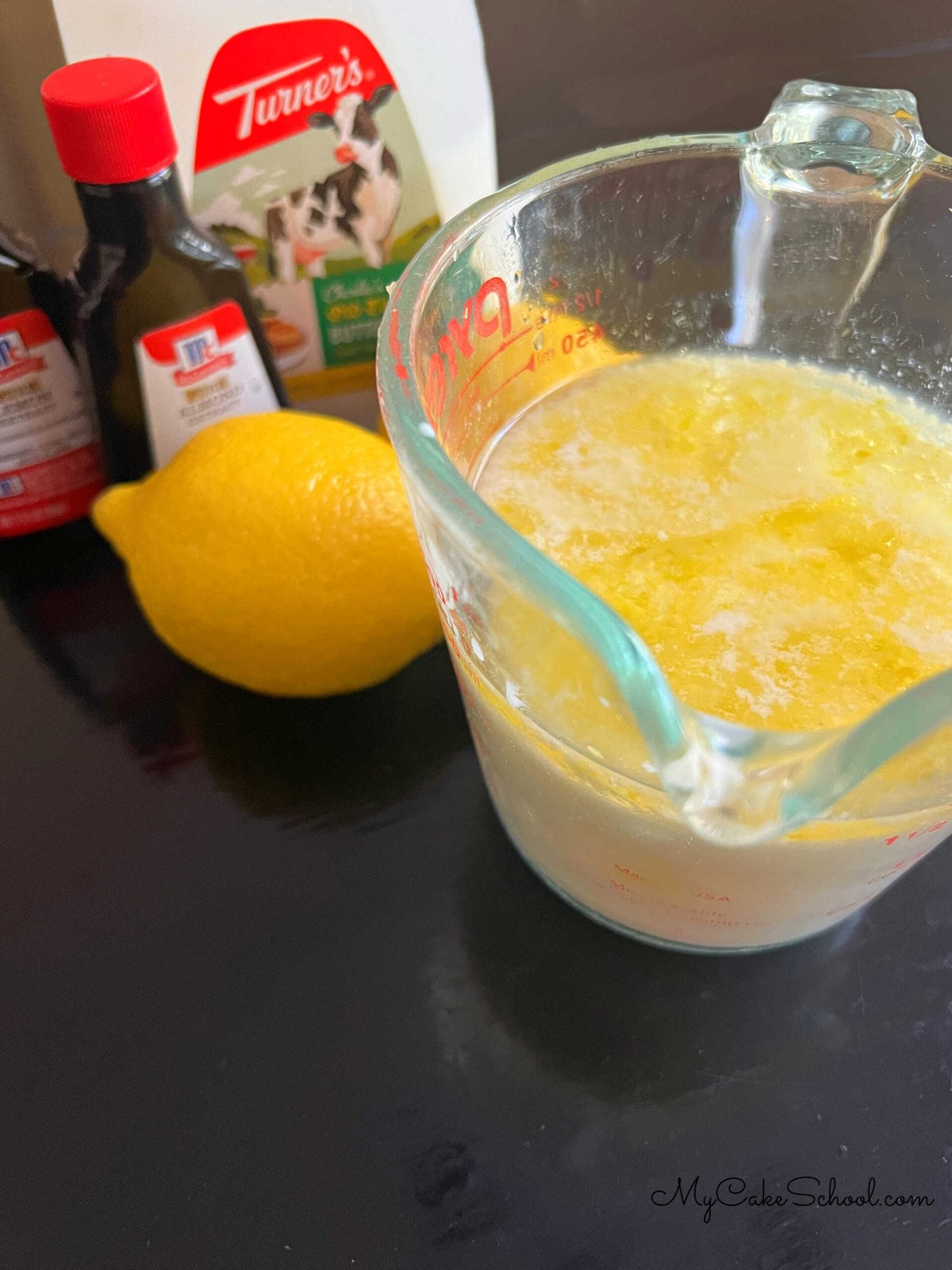 Wet ingredients for Lemon Almond Cake.